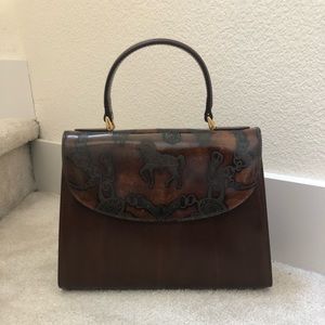 Brand new Italian bag 8 1/2 x 10 inch carry around wrist or grasp by hand.